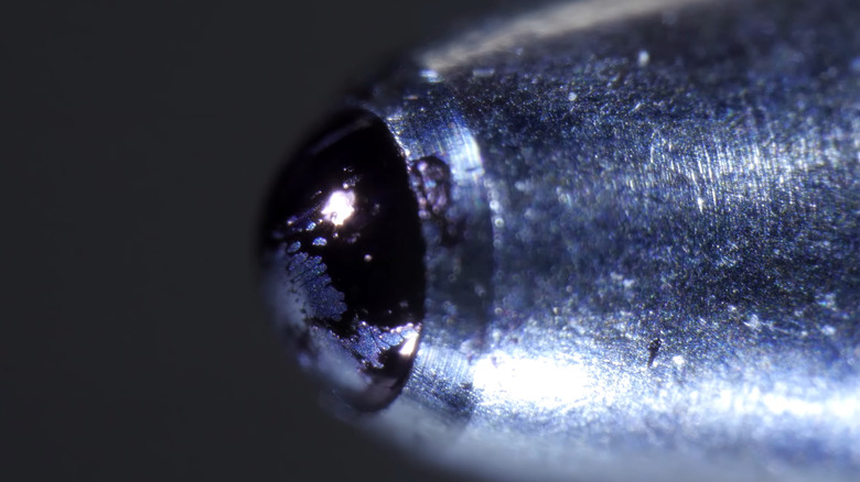 End of a ballpoint pen up close
