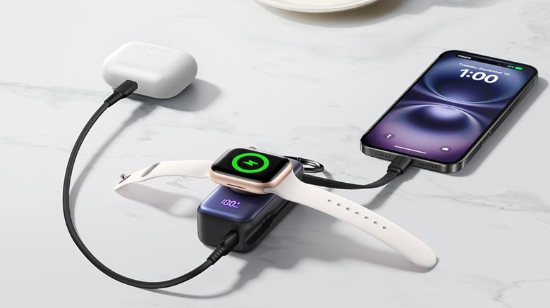 The Iniu SnapGo Portable Charger charging several devices.