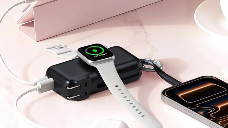 A Rorry Flow Portable Charger charging several devices.