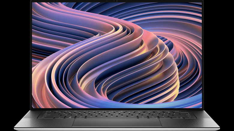 The Dell XPS 9520 on a black background