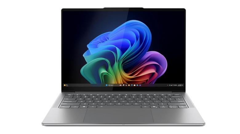 The Lenovo Yoga Slim 7i Aura Edition, a sleek, thin laptop with a grey body and a black screen frame