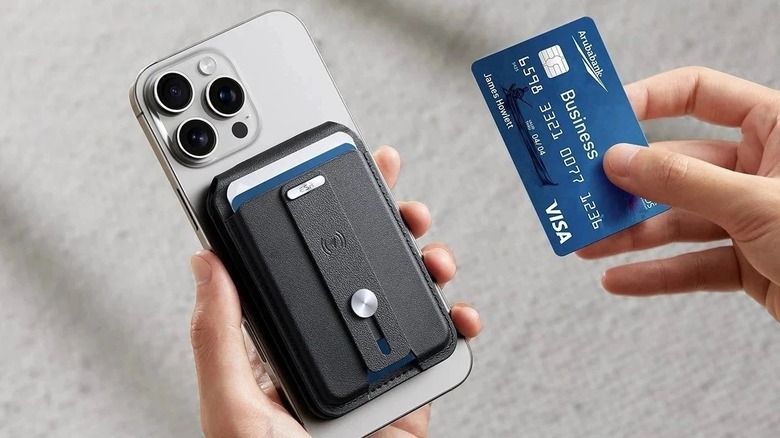 Close-up of a person using the ESR Geo for MagSafe Wallet on their iPhone