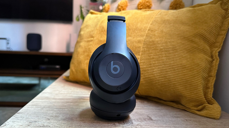 Beats Studio Pro headphoens with some cushions behind it