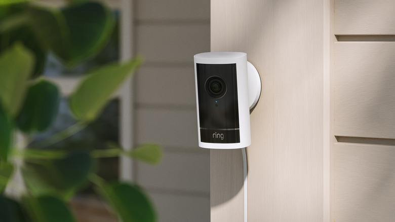 An outdoor Ring camera on the side of a house