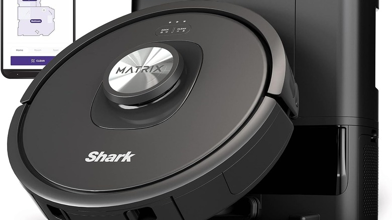 The Shark RV2310AE Matrix Self-Emptying Robot Vacuum is pictured against a white background.