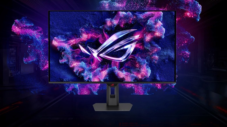 Asus ROG Strix XG32UCDS 4K Monitor in a marketing shot with glittery cloud in the background