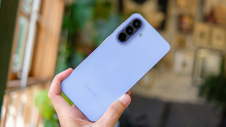 Person holding a Samsung Galaxy A57 smartphone