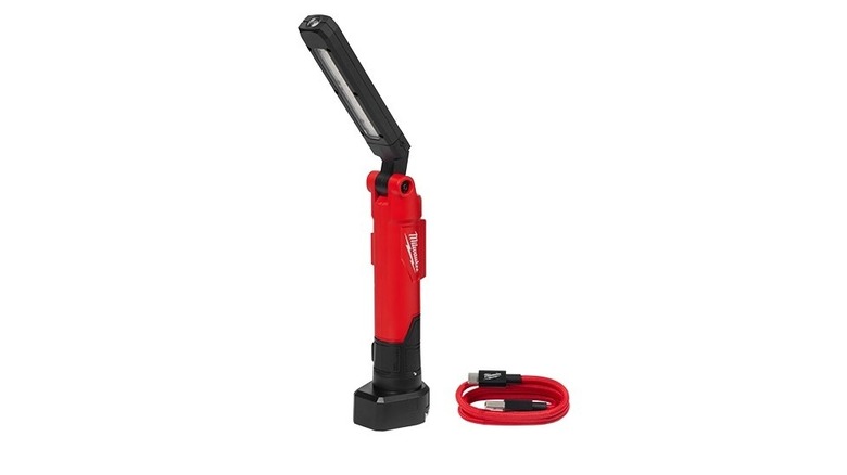 Milwaukee RedLithium USB Stick Light with charging cord visible.