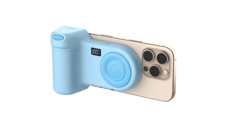 A magnetic smartphone grip and charger in light blue.
