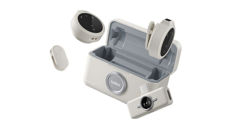 A Belkin wireless microphone set, dongle, and charging case.