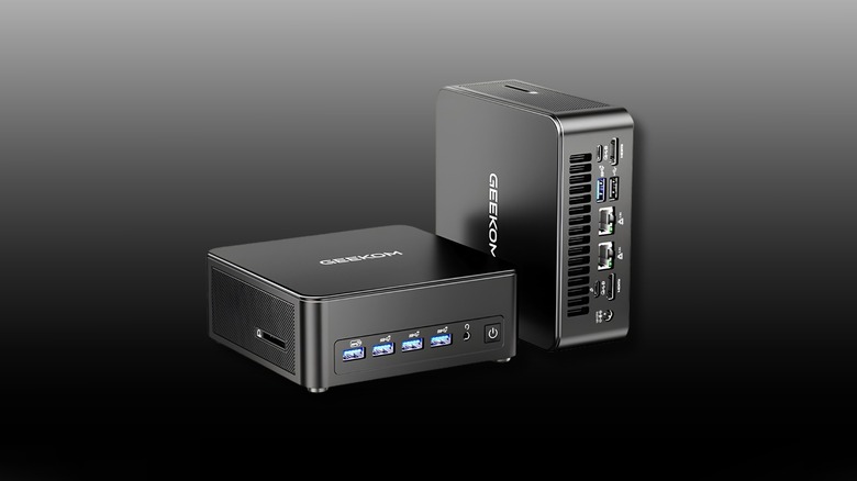 GEEKOM IT13 Max AI back and front view on a black-and-white gradient background