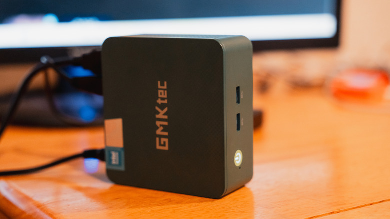 A GMKtec mini PC on a desk