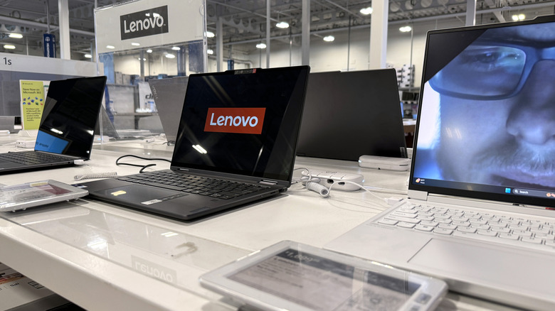 Lenovo laptops on display at a Best Buy.