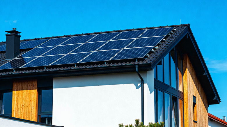 Solar panels covering the roof of a house.