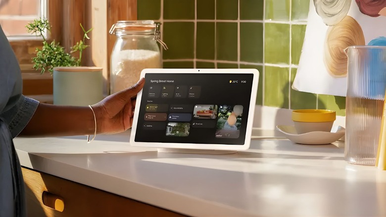 Google Tablet being used as a smart home hub on a kitchen counter
