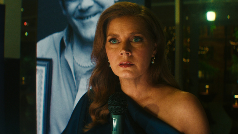 Anna Bowden (Amy Adams) looks puzzled and terrified as she gives a speech in Cape Fear
