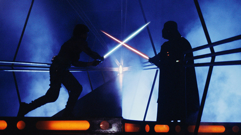 Luke Skywalker and Darth Vader fighting with lightsabers