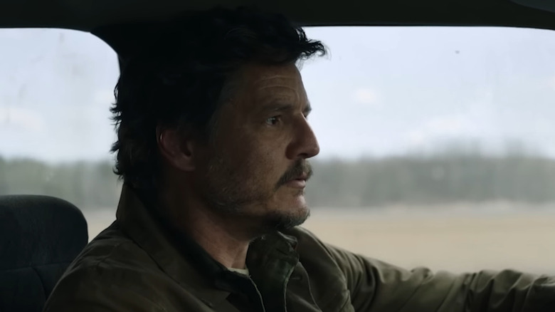 Joel driving through abandoned landscape in The Last of Us (2023)