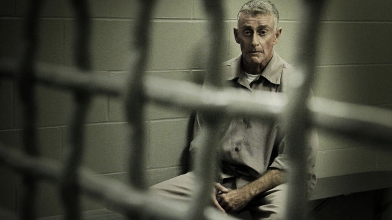 Michael Peterson sitting behind bars