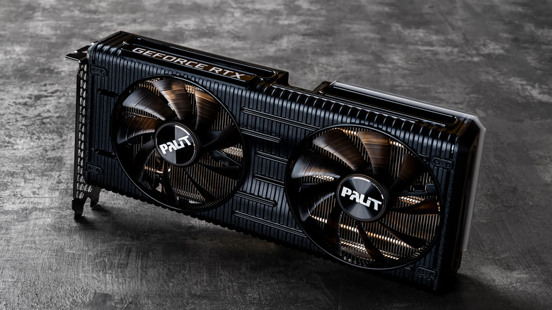 GeForce RTX graphics card on dark stone background