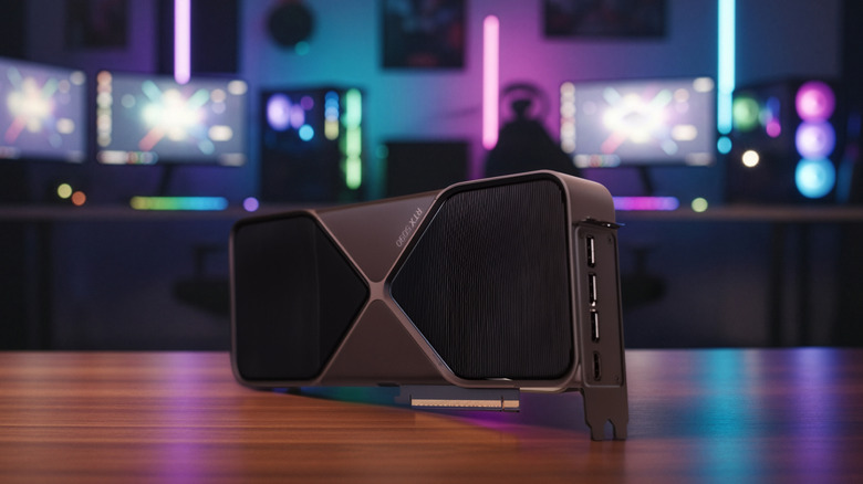 RTX 5090 graphics card on desk with colorful background