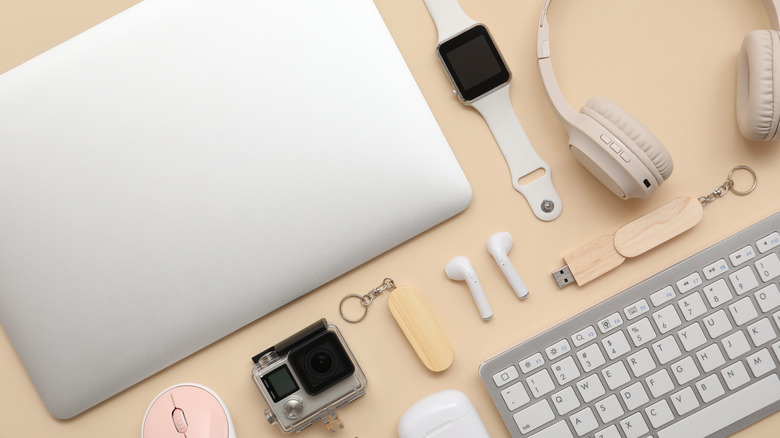 A number of assorted gadgets on a table