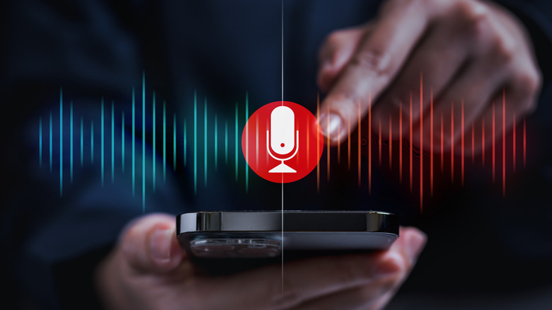 a smartphone with a voice recording graphic on top