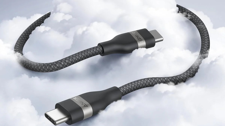 A USB-C to USB-C cable on a cloud