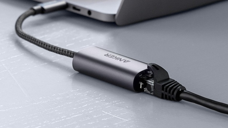 Close-up of Anker PowerExpand USB-C to Gigabit Ethernet Adapter connected to a MacBook