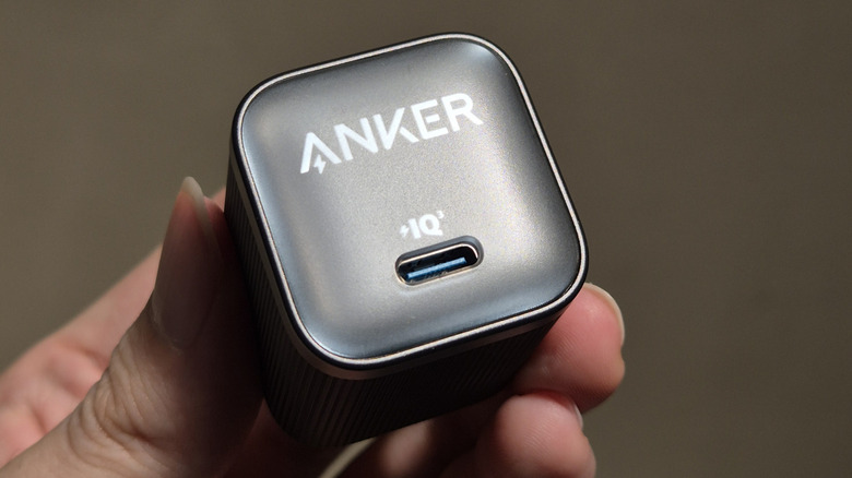 Close-up of a person holding the Anker 45W Nano charger