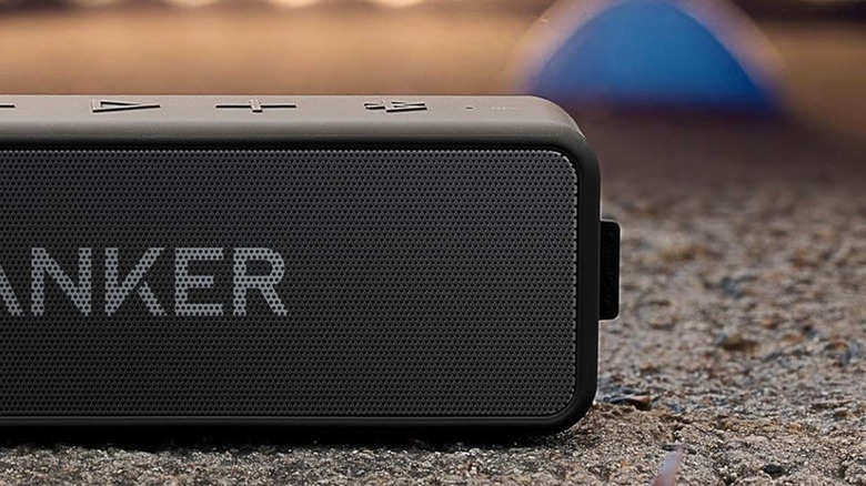 An Anker Soundcore 2 Speaker on the beach.