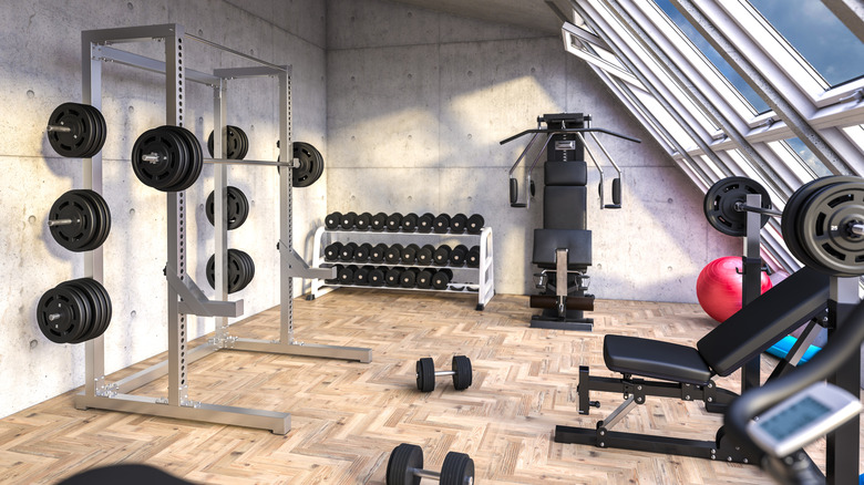 A home gym full of various equipment.