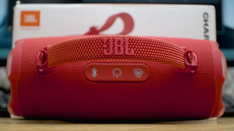 The top of the JBL Charge 6 speaker in red.