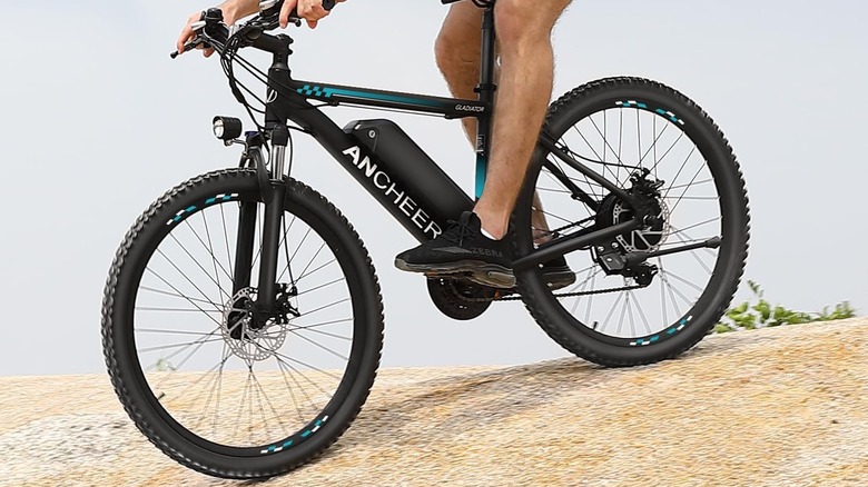 Man riding Ancheer Electric Bike for Adults