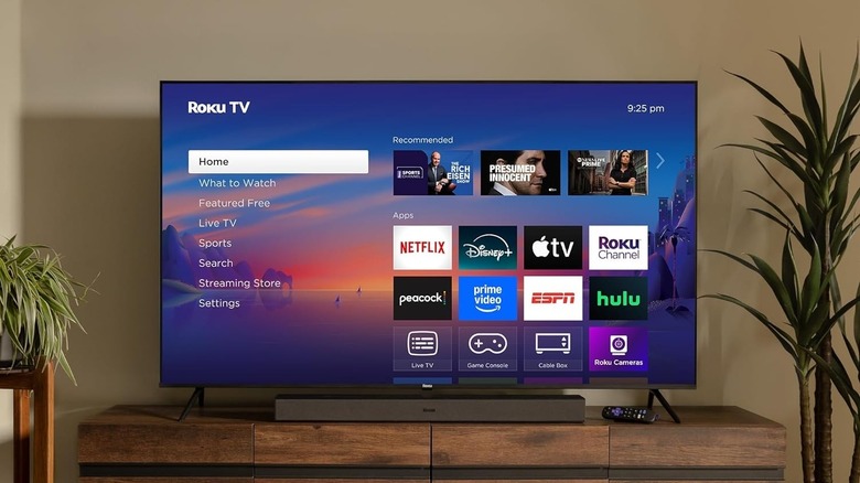 Roku Select Series TV in a living room displaying apps