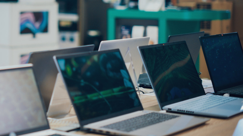 Laptops on display at a tech store