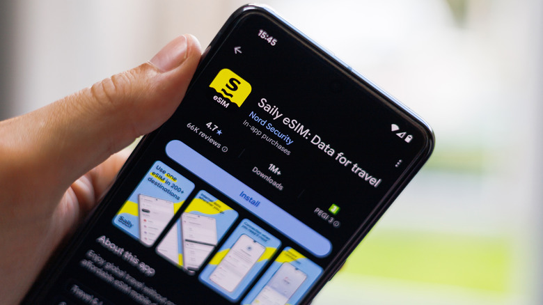 Smartphone displaying Saily eSIM app page on the Google Play Store.