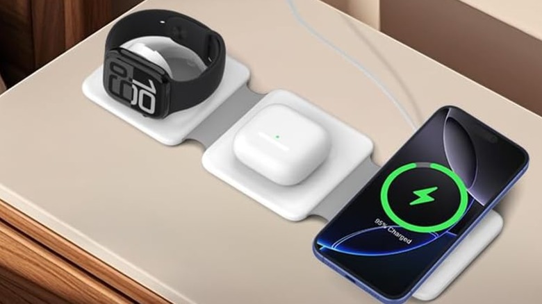 Several devices charging on an Iseyyox Foldable Magnetic Charging Dock.