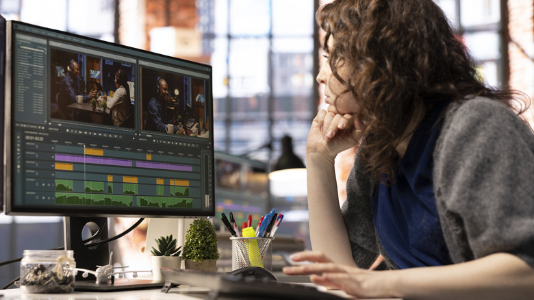 Person looking over video clips in video editing software