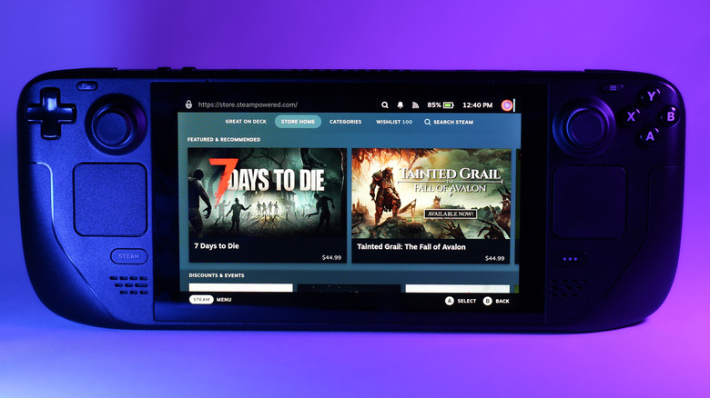 Steam Deck showing Steam Store on display on purple background