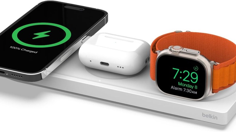 The Belkin charger is seen charging three devices.
