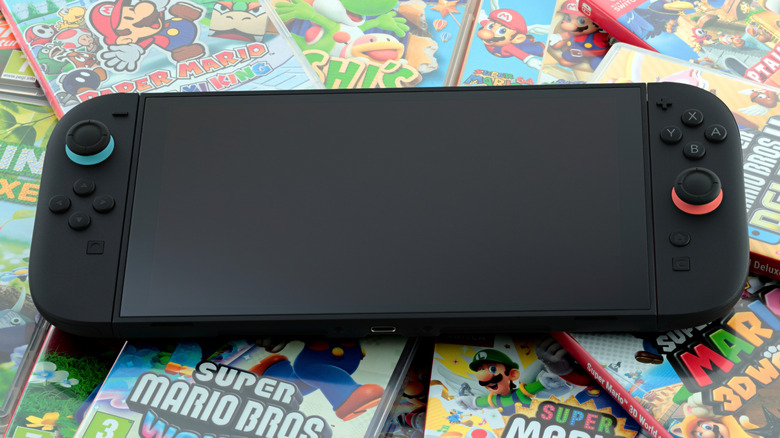 Nintendo Switch 2 console resting on some Switch 2 game packages