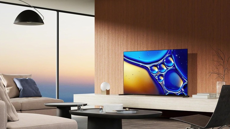 The Sony Bravia 8 II set up on a stand in a chic living room.