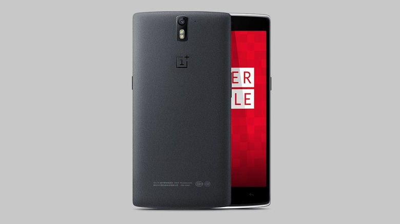 The OnePlus One with its black sandstone back and front display side by side.