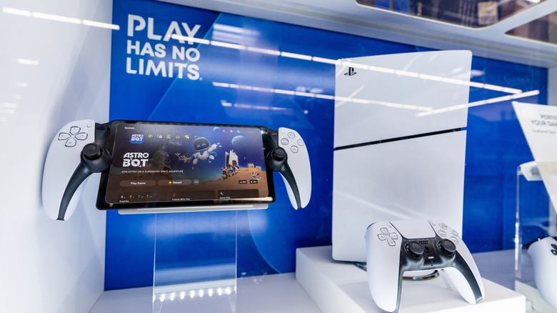 A PlayStation 5 console and accessories on display.