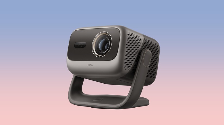 The JMGO N3 Ultimate projector against a gradient background