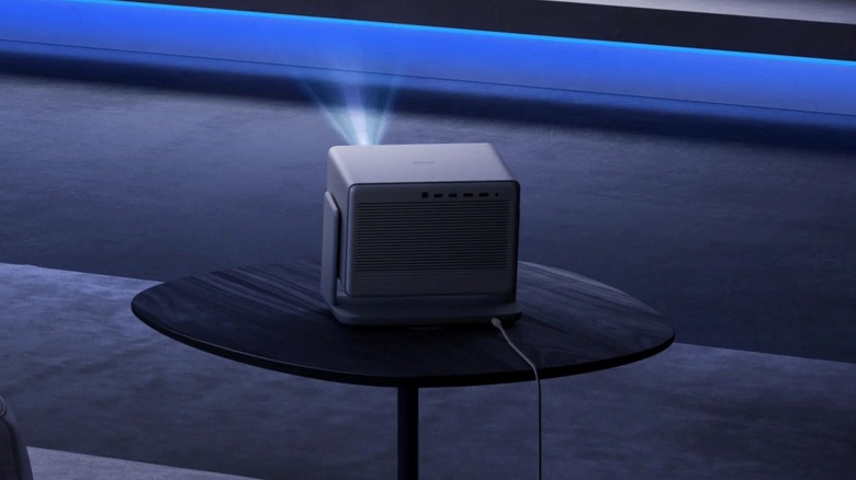 The Xgimi Horizon 20 on a table projecting to a screen