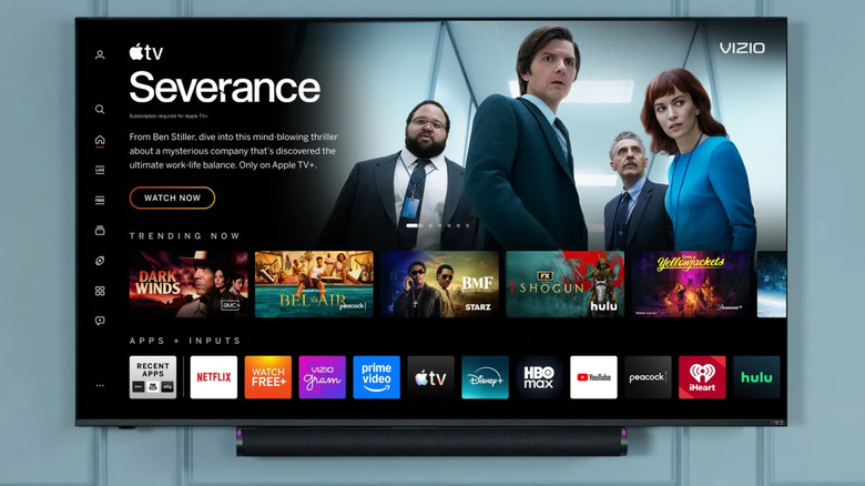 The Vizio VQM55C-10 wall-mounted to a gray wall.