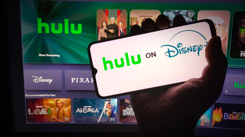 Hulu and Disney+ logo displayed on a smartphone