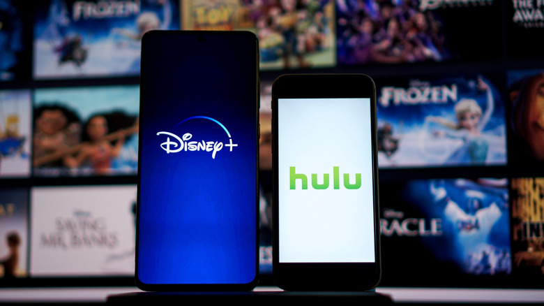 Disney+ and Hulu logo displayed on smartphone screens